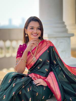Green elegant art silk woven saree with rich zari border 5