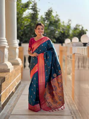 Turquoise elegant art silk woven saree with rich zari border 1