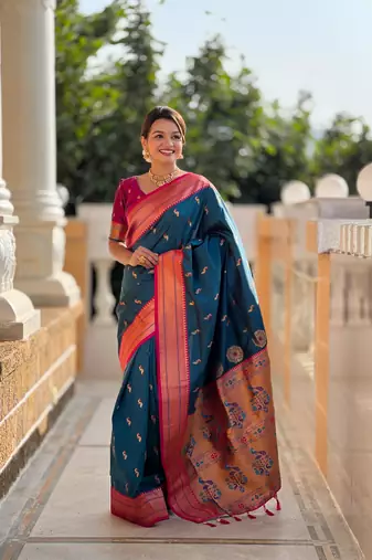 Turquoise elegant art silk woven saree with rich zari border