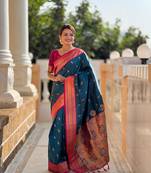 Turquoise elegant art silk woven saree with rich zari border