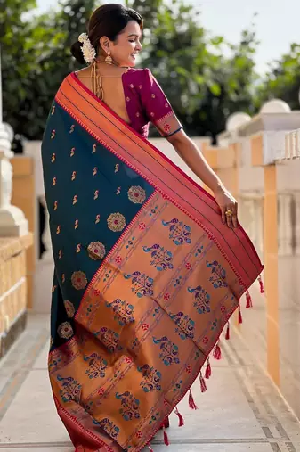 Turquoise elegant art silk woven saree with rich zari border