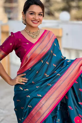 Turquoise elegant art silk woven saree with rich zari border