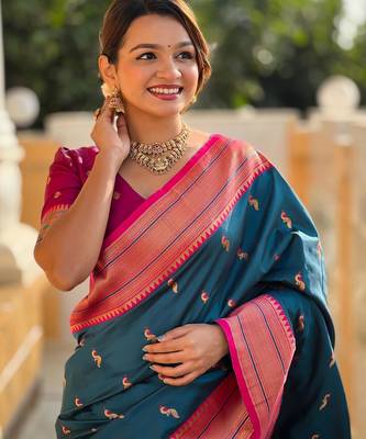 Turquoise elegant art silk woven saree with rich zari border 4