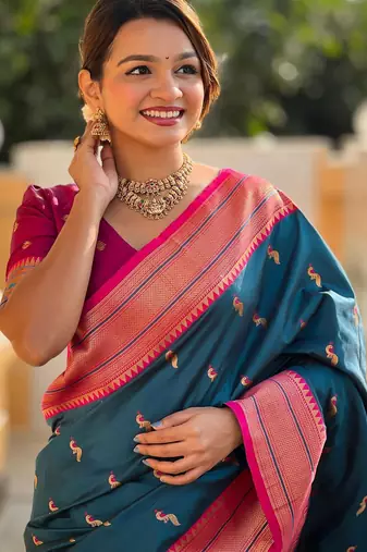 Turquoise elegant art silk woven saree with rich zari border