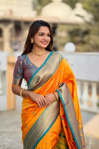 Mustard elegant art silk woven saree with rich zari border