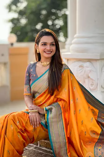Mustard elegant art silk woven saree with rich zari border