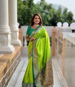 Green elegant art silk woven saree with rich zari border