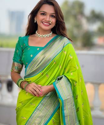 Green elegant art silk woven saree with rich zari border 4
