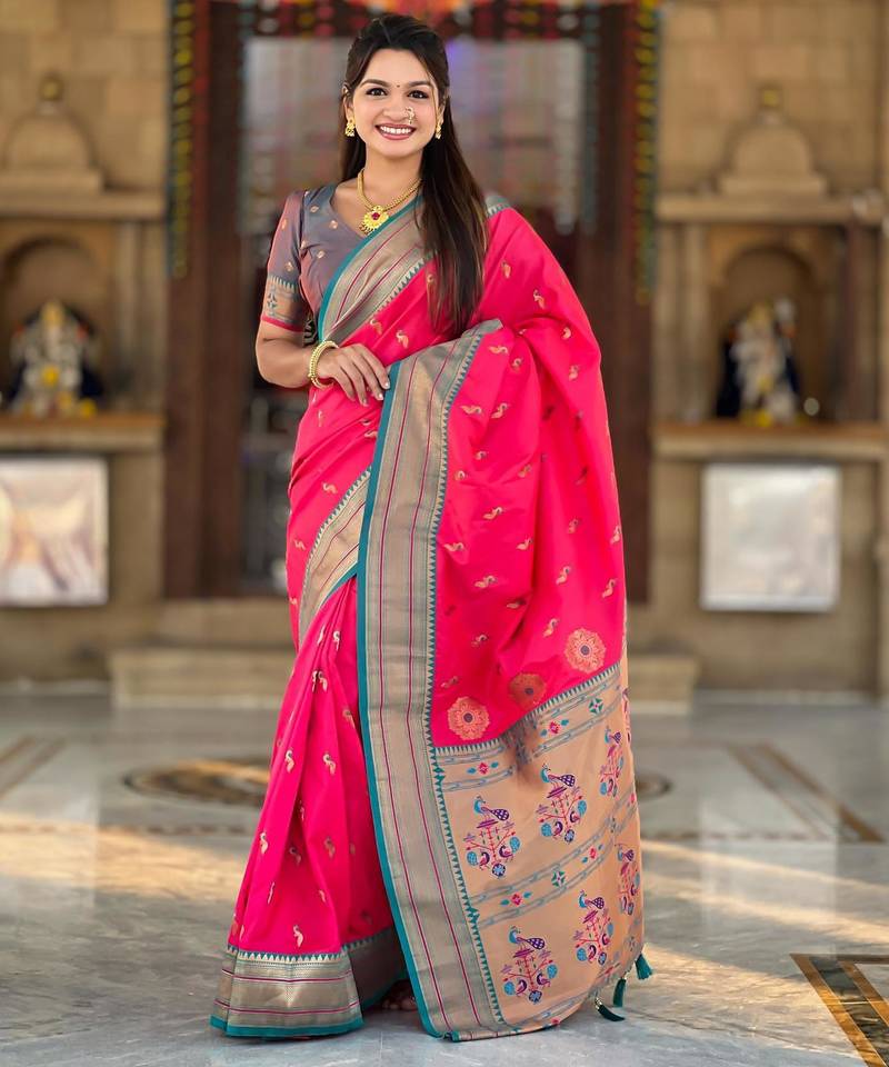 Pink elegant art silk woven saree with rich zari border
