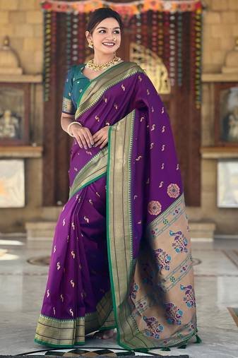 Wine elegant art silk woven saree with rich zari border