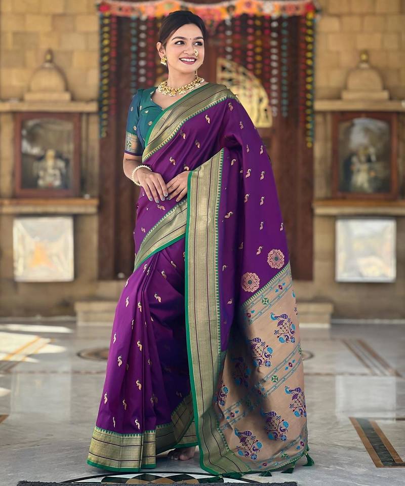 Wine elegant art silk woven saree with rich zari border