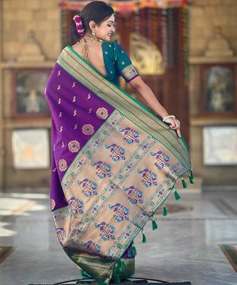 Wine elegant art silk woven saree with rich zari border 2