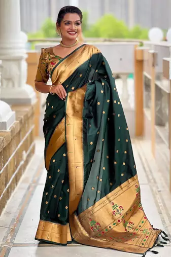 Green elegant art silk woven saree with rich zari border