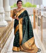 Green elegant art silk woven saree with rich zari border