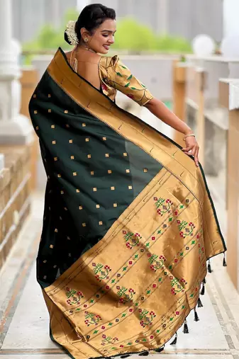 Green elegant art silk woven saree with rich zari border