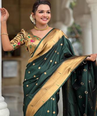 Green elegant art silk woven saree with rich zari border 3