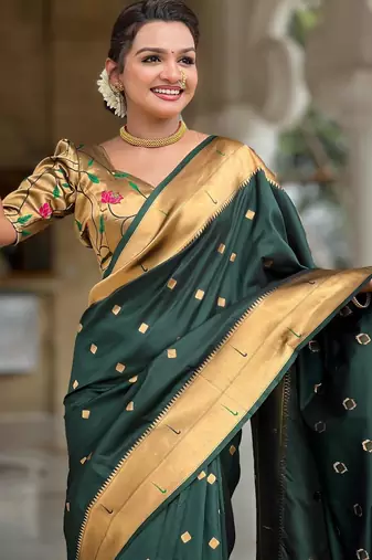 Green elegant art silk woven saree with rich zari border