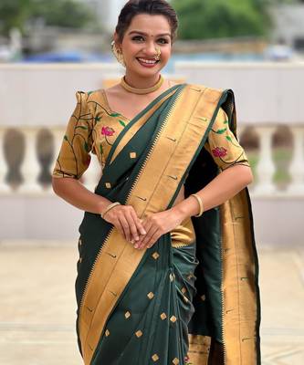 Green elegant art silk woven saree with rich zari border 4