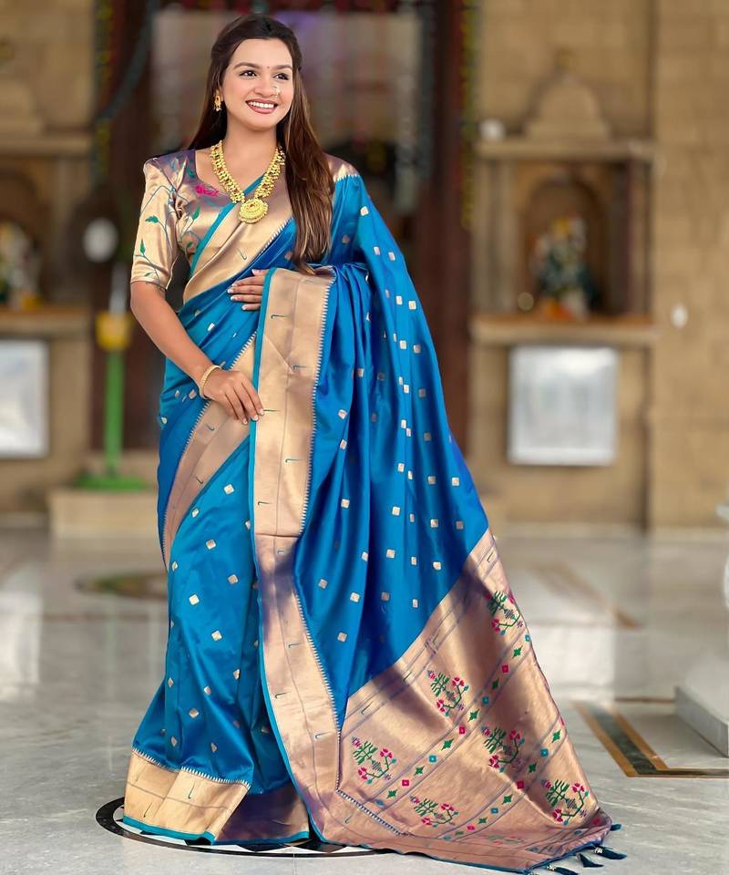 Turquoise elegant art silk woven saree with rich zari border