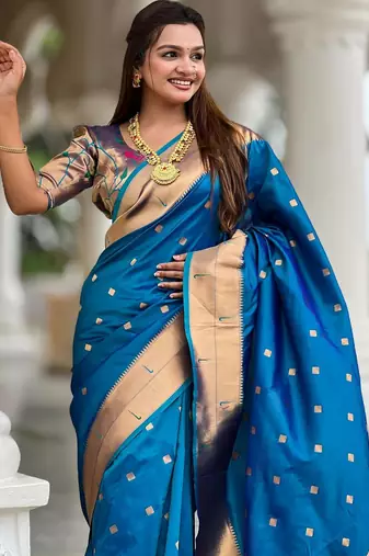 Turquoise elegant art silk woven saree with rich zari border