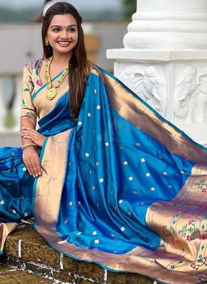 Turquoise elegant art silk woven saree with rich zari border 5