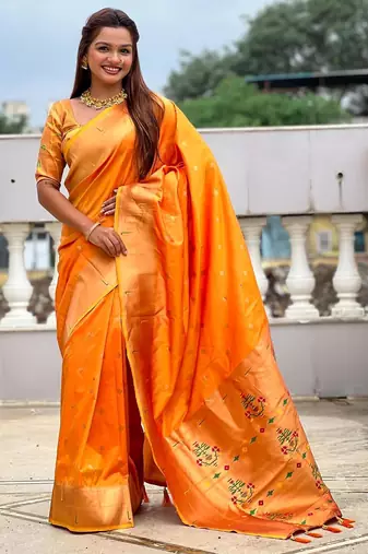 Orange elegant art silk woven saree with rich zari border
