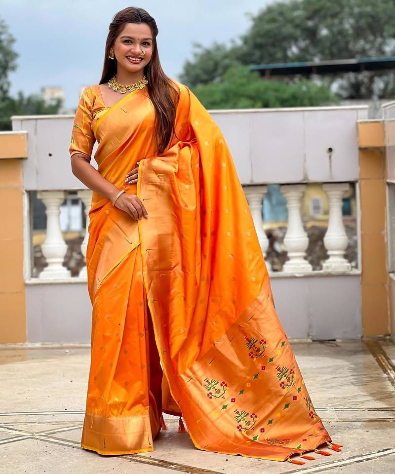 Orange elegant art silk woven saree with rich zari border