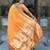 Orange elegant art silk woven saree with rich zari border