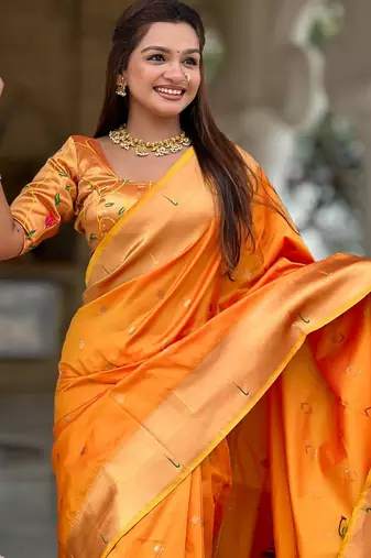 Orange elegant art silk woven saree with rich zari border
