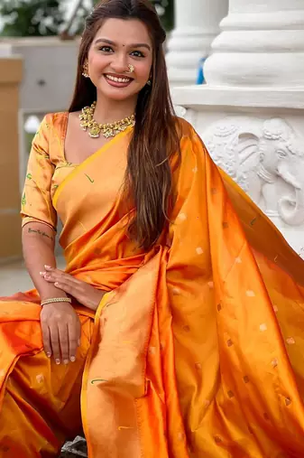 Orange elegant art silk woven saree with rich zari border