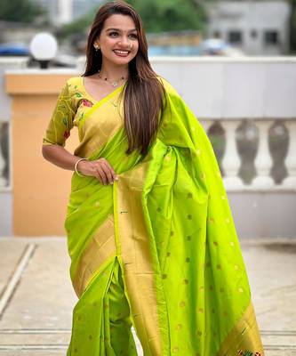 Green elegant art silk woven saree with rich zari border 4