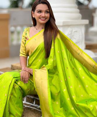 Green elegant art silk woven saree with rich zari border 5