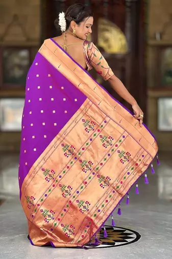 Purple elegant art silk woven saree with rich zari border