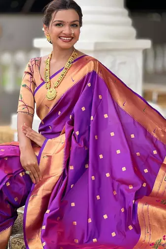 Purple elegant art silk woven saree with rich zari border