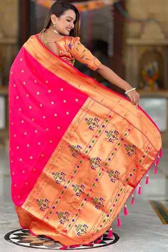 Pink elegant art silk woven saree with rich zari border