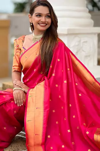 Pink elegant art silk woven saree with rich zari border