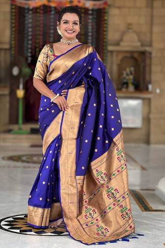 Violet elegant art silk woven saree with rich zari border