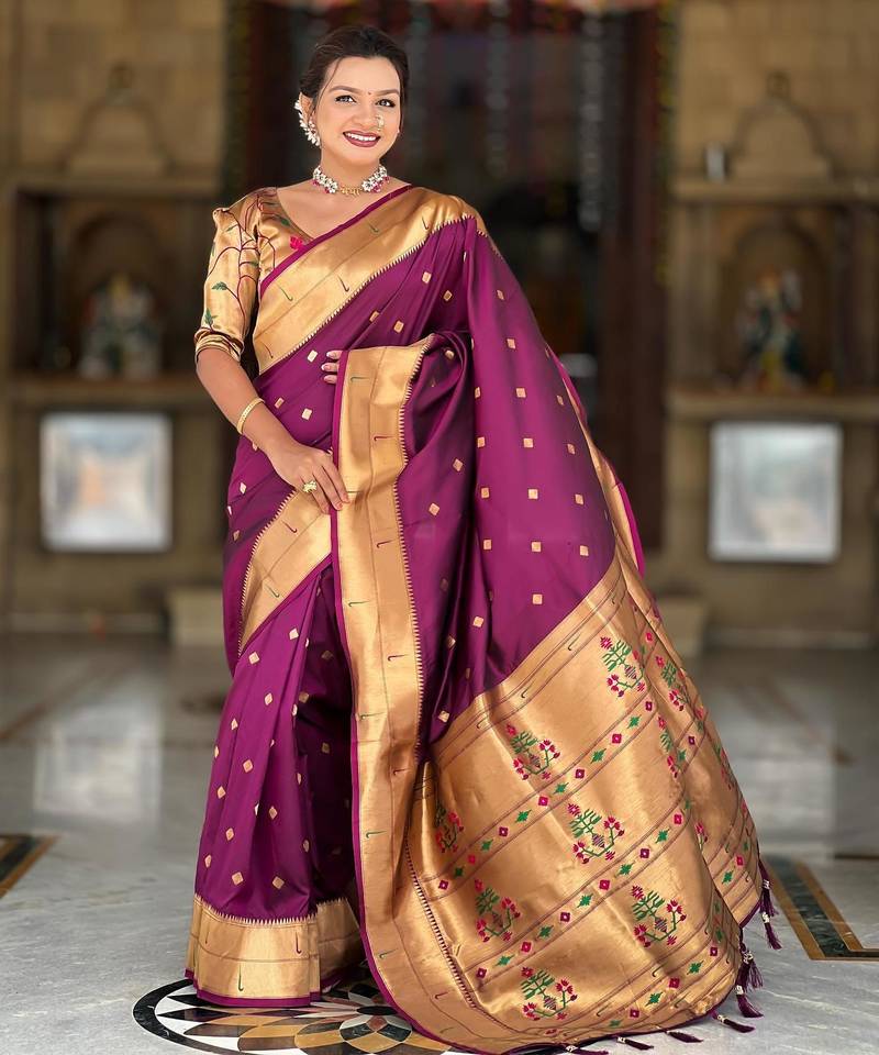 Wine elegant art silk woven saree with rich zari border