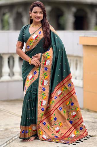 Green elegant art silk woven saree with rich zari border