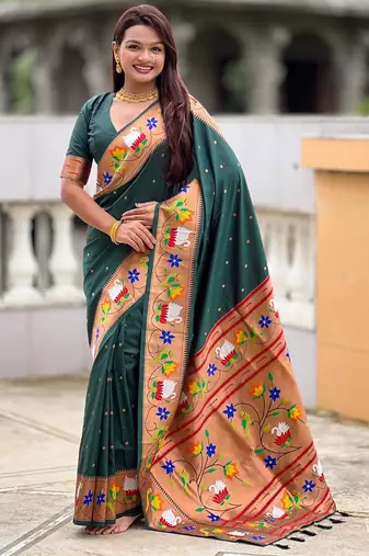 Green elegant art silk woven saree with rich zari border