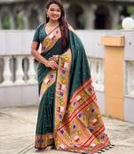 Green elegant art silk woven saree with rich zari border