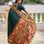 Green elegant art silk woven saree with rich zari border