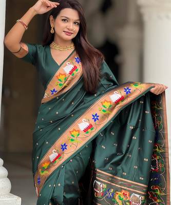 Green elegant art silk woven saree with rich zari border 3