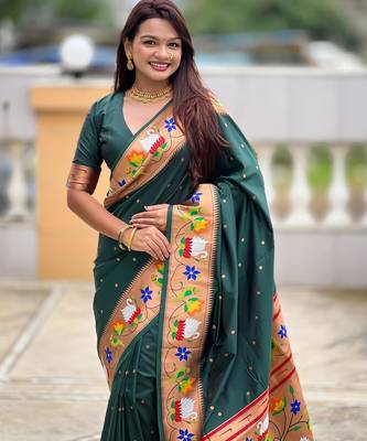 Green elegant art silk woven saree with rich zari border 4