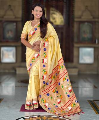 Cream elegant art silk woven saree with rich zari border 1