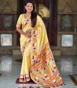 Cream elegant art silk woven saree with rich zari border
