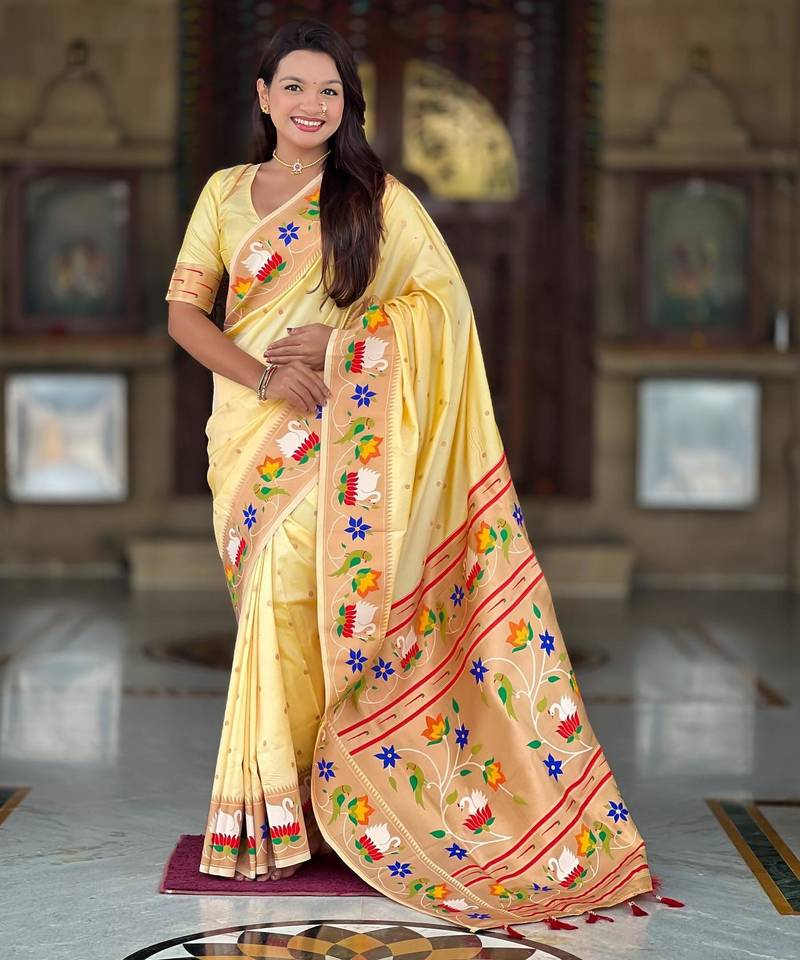 Cream elegant art silk woven saree with rich zari border