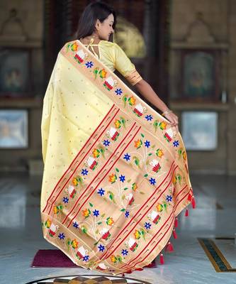 Cream elegant art silk woven saree with rich zari border 2