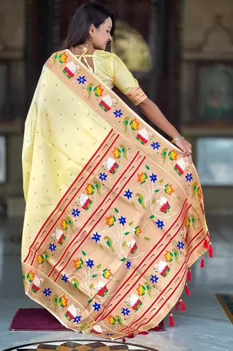 Cream elegant art silk woven saree with rich zari border