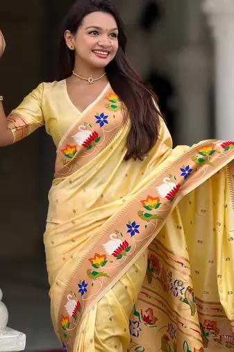 Cream elegant art silk woven saree with rich zari border